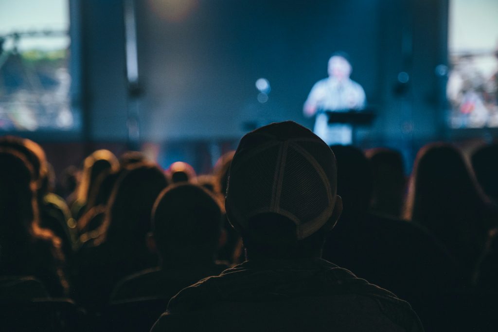 Sponsorship consultant vs agency: speaker presenting to a business audience