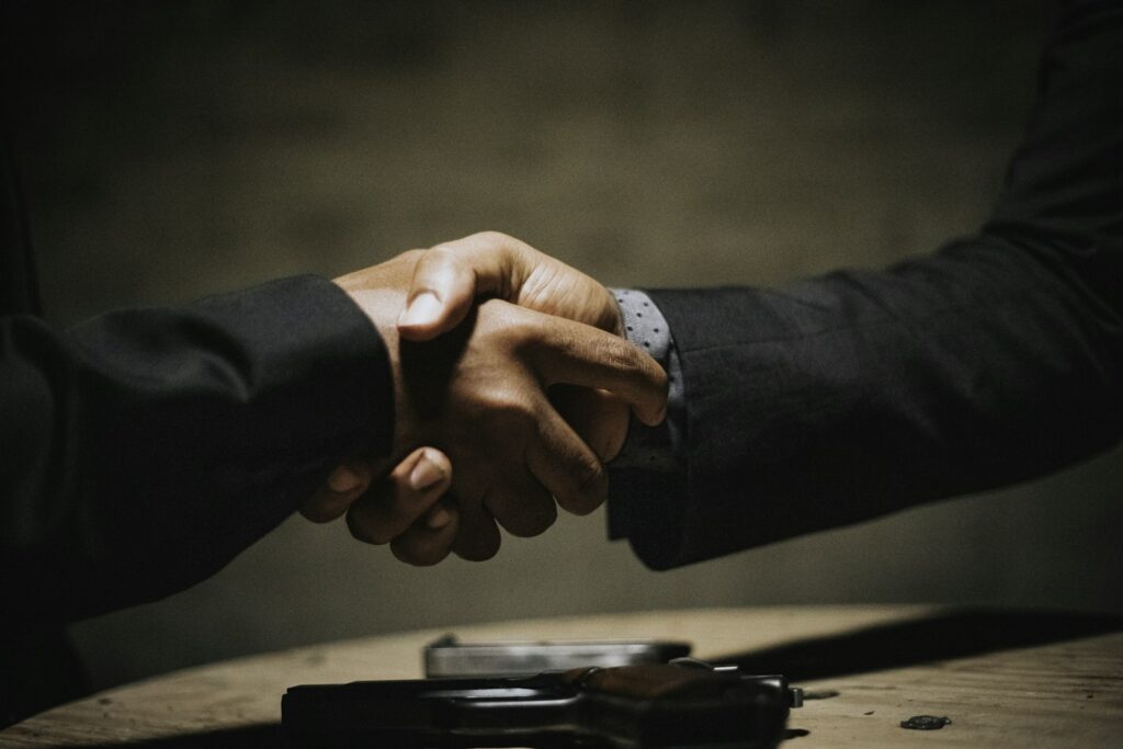 Business partners discussing the cost of event sponsorship