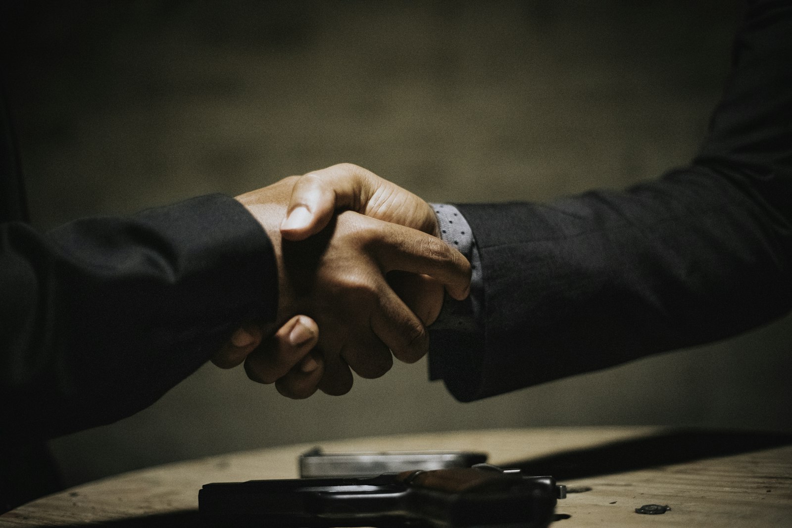 Business partners discussing the cost of event sponsorship