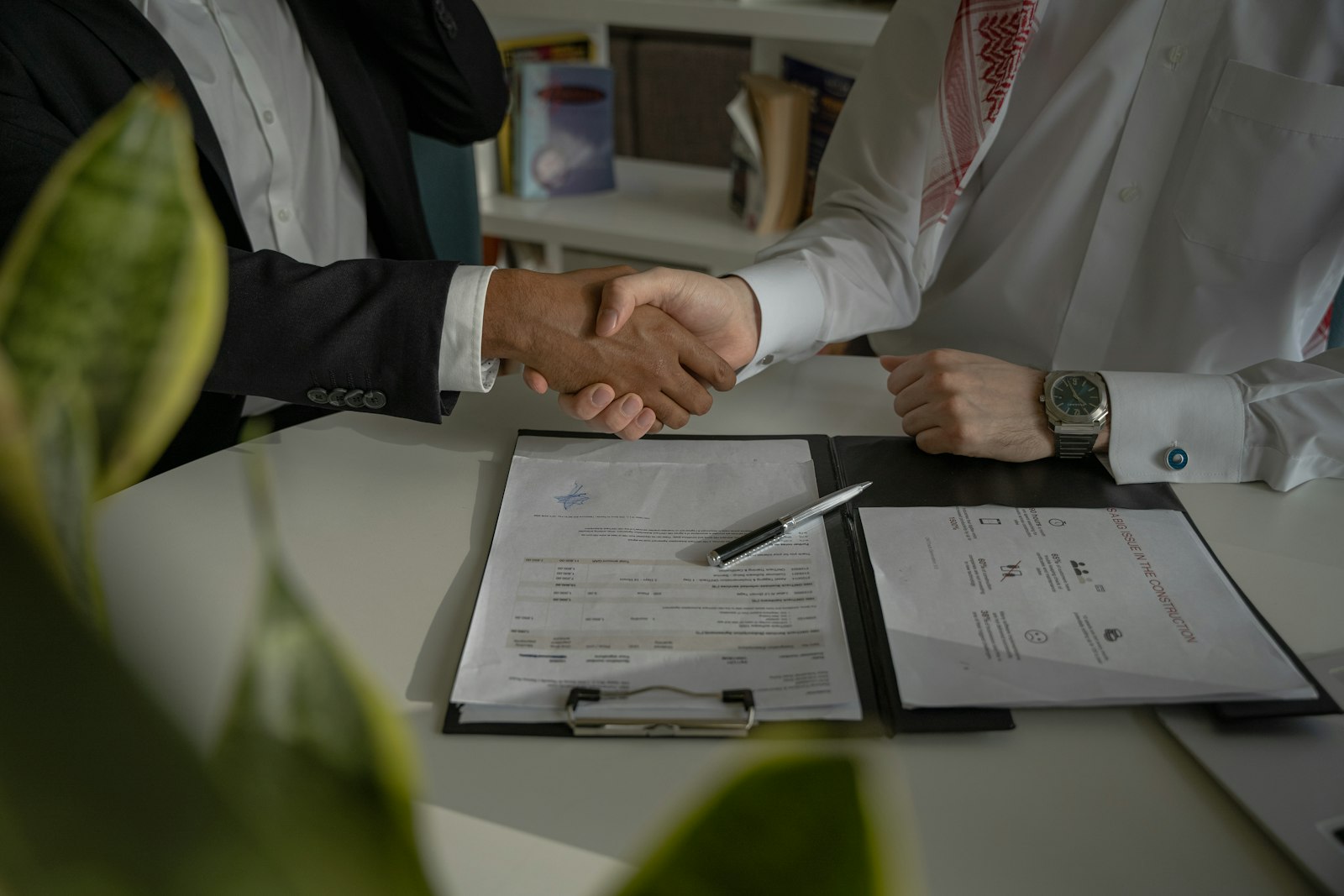 Negotiate celebrity appearance fee contract discussion handshake