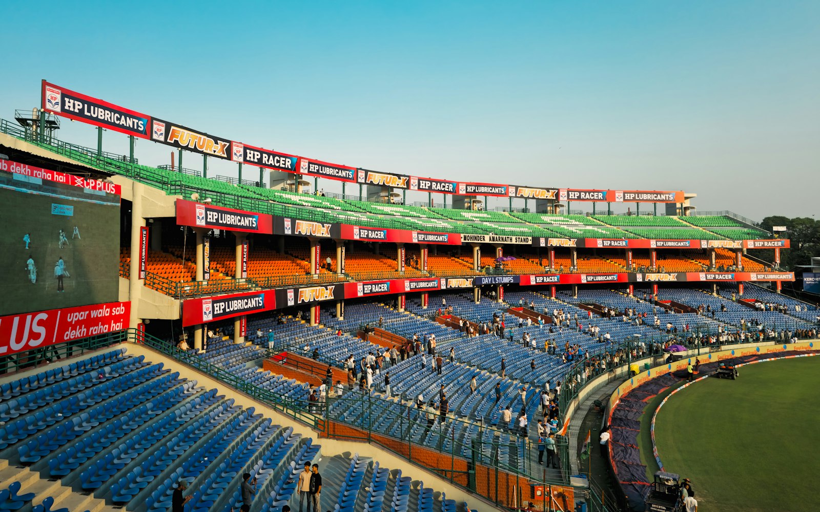 Stadium signage illustrating title sponsor vs presenting sponsor branding